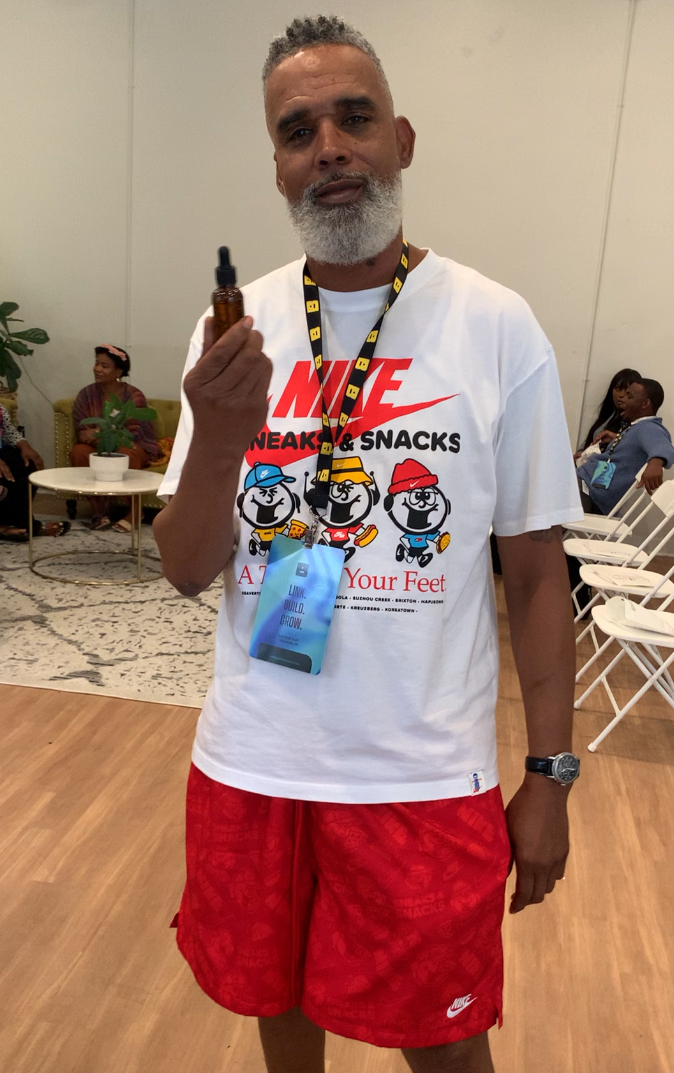 Man holding herbal wellness product